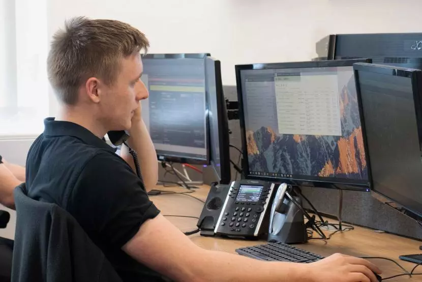 A Carden IT support team member on the phone to a client