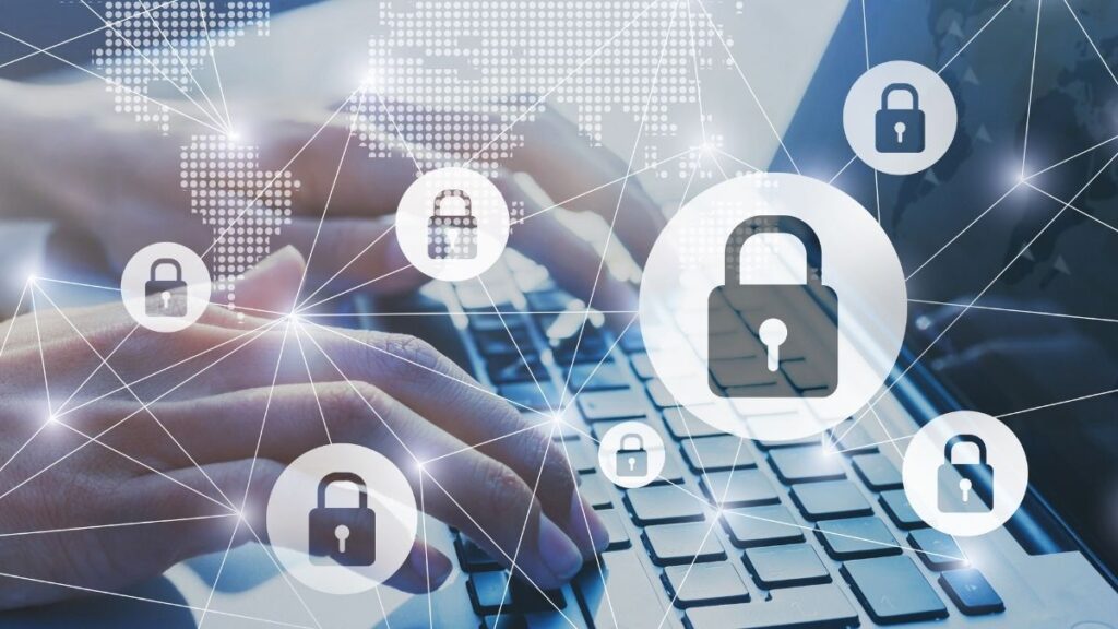 Hands typing on laptop with floating padlock logos