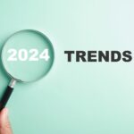magnifying glass highlighting the year 2024 in the phrase 2024 trends